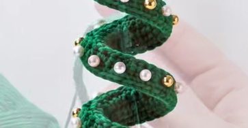 Green crochet spiral Christmas tree ornament with pearl beads