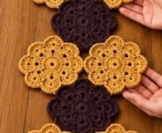 Crochet floral wall hanging with mustard flowers and a tassel