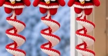 Hanging crochet Santa ornaments with red and white spirals