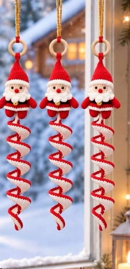 Hanging crochet Santa ornaments with red and white spirals
