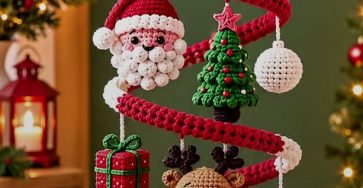 Red and white crochet spiral Christmas tree decoration with mini crochet ornaments